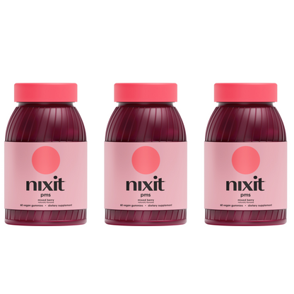 Three jars of nixit PMS mixed berry vegan gummies, dietary supplement with red and pink packaging on a white background.