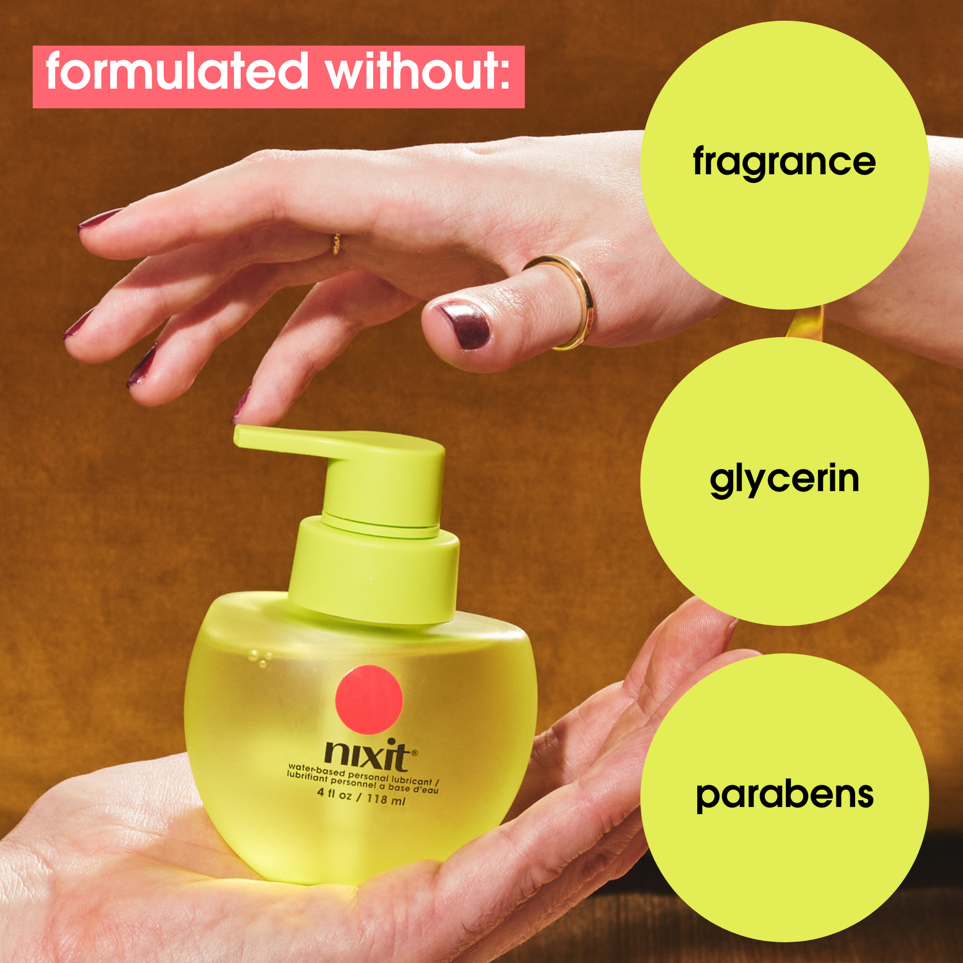 a hand reaches for a bottle of lubricant. 3 circles each contain the words,' formulated without fragrance, glycerin, parabens' 