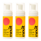 Three bottles of full size nixit menstrual cup cleanser and vulva wash are side by side