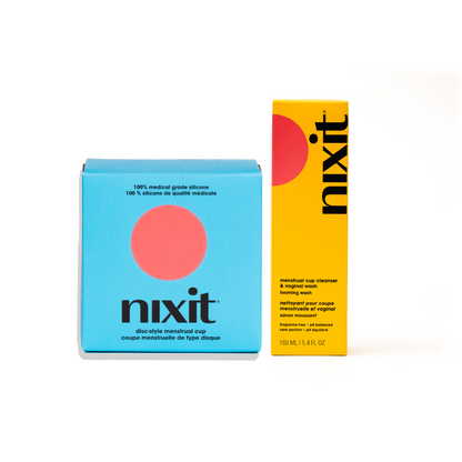 the nixit disc-style menstrual cup teal packaging box is next to the menstrual cup cleanser and vaginal foaming wash box