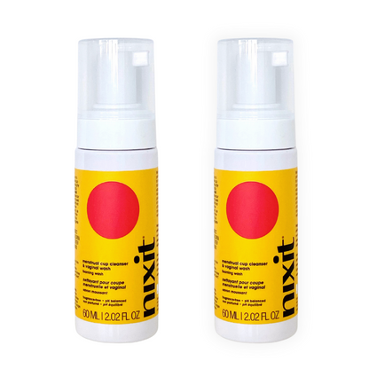 Two bottles of travel size nixit menstrual cup cleanser and vulva wash are side by side